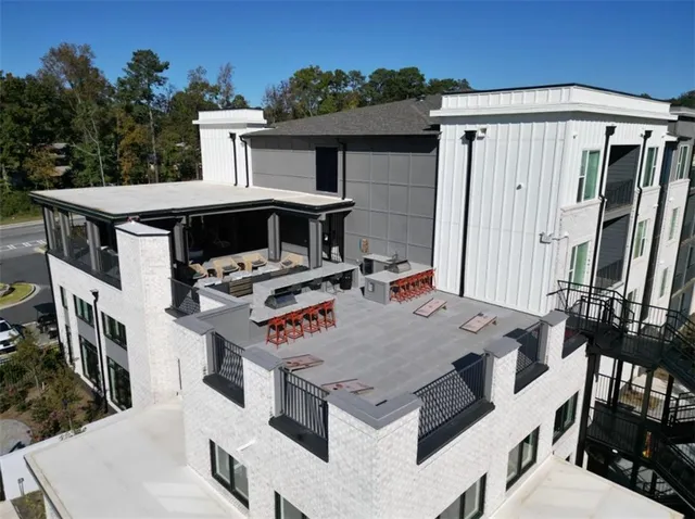 a view of a dinning table and chairs in the patio