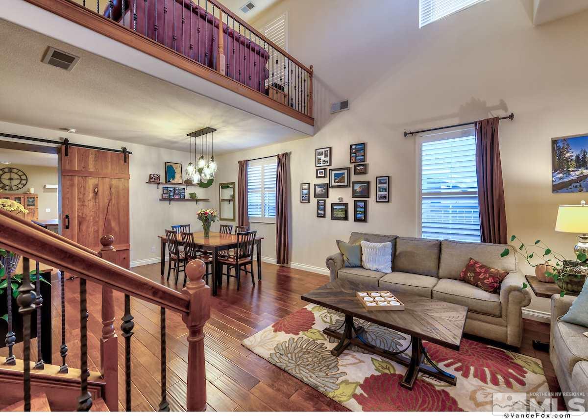 598 Needles Court Reno, NV 89521 - Photo 6 of 25 a living room with furniture and a wooden floor