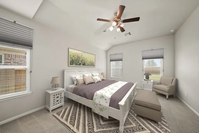 a view of a hallway with wooden floor and a kitchen