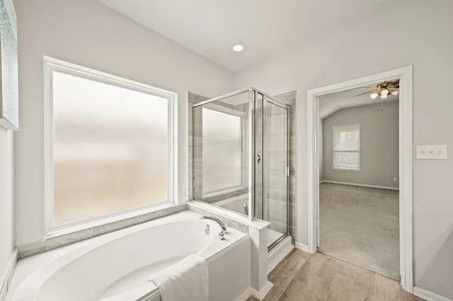 a bathroom with a sink double vanity and a mirror