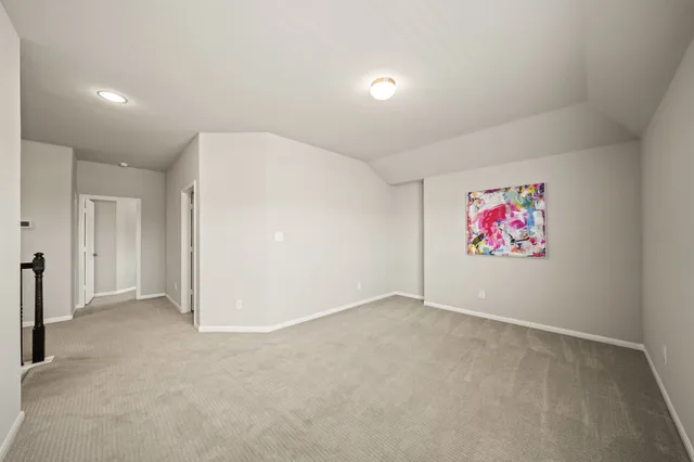 a bed room with furniture and a window