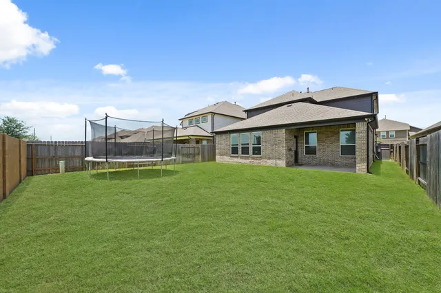 a view of a garden with a slide