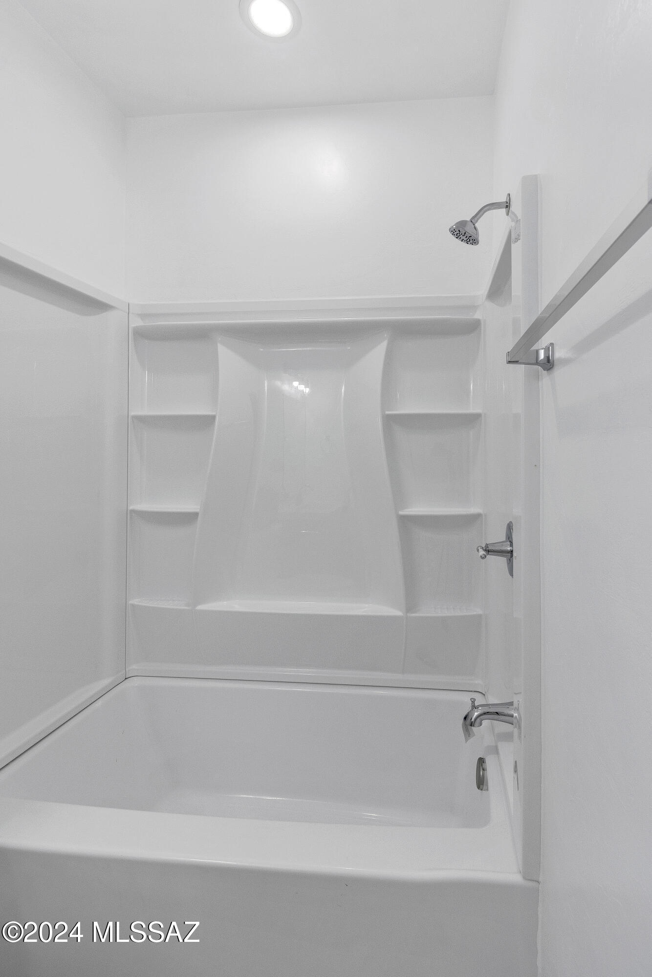 221 Paseo Mascota Rio Rico, AZ 85648 - Photo 27 of 45 a bathroom with a bathtub