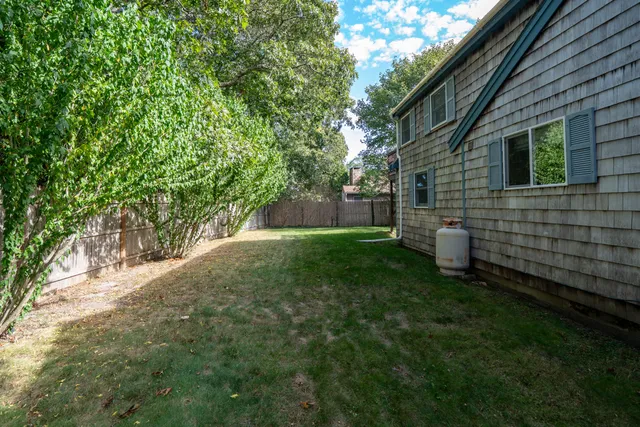 a view of a back yard of the house