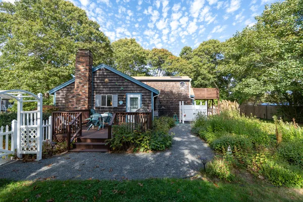 a backyard of a house with lots of green space