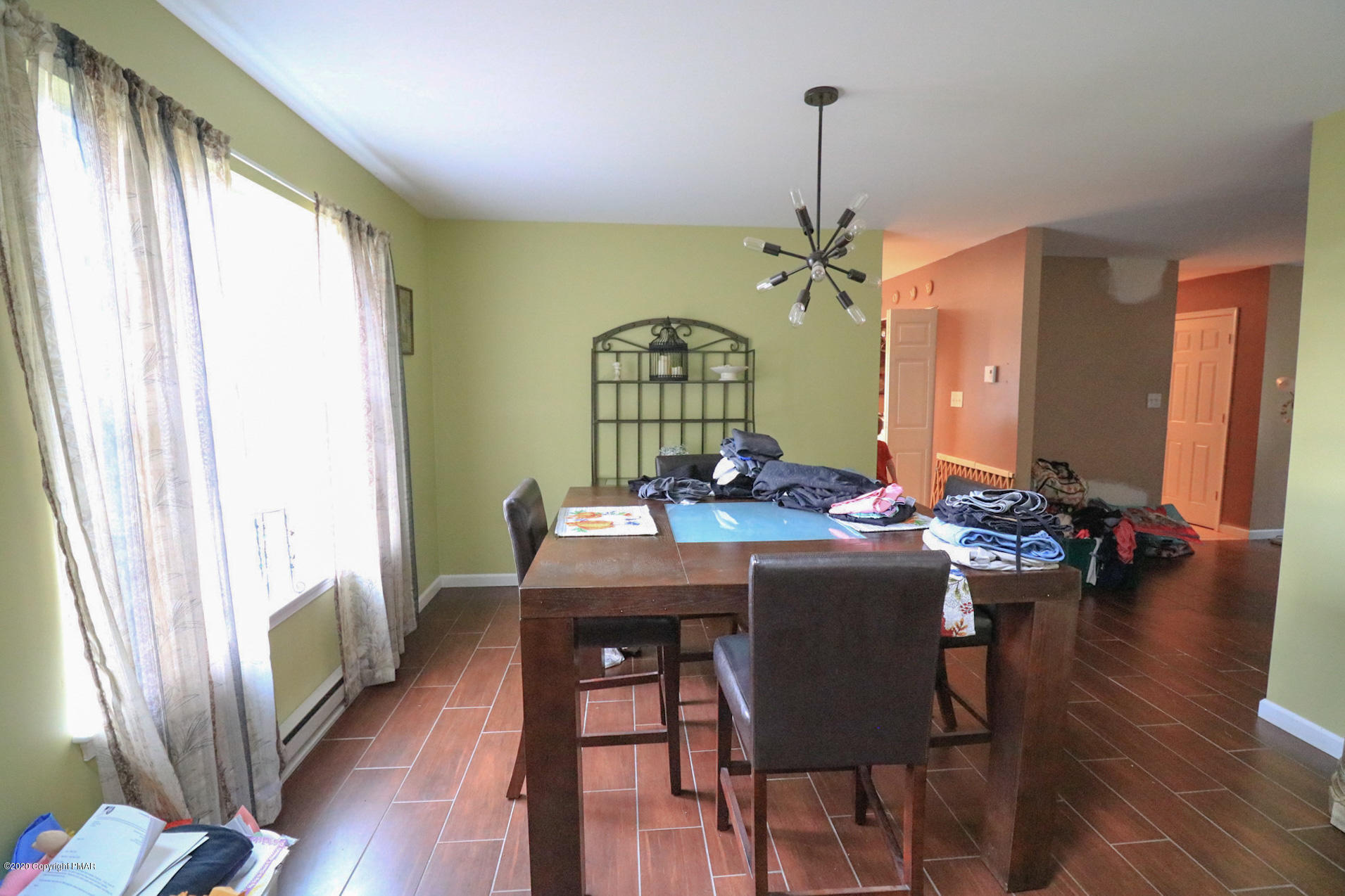 1024 State Road Effort, PA 18330 - Photo 14 of 46 a view of a dining room with furniture window and wooden floor