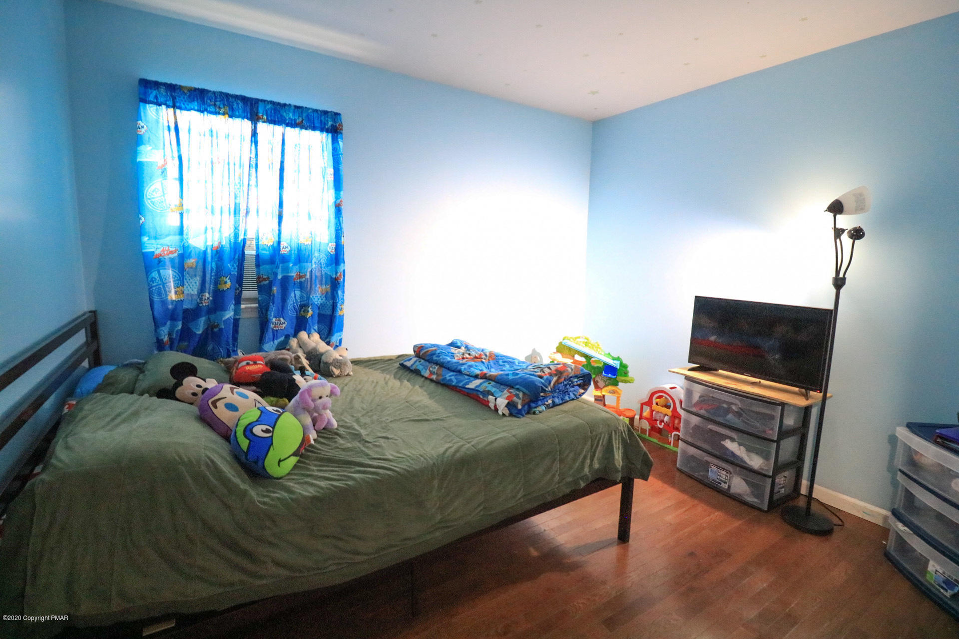 1024 State Road Effort, PA 18330 - Photo 31 of 46 a bed sitting in a bedroom next to a window
