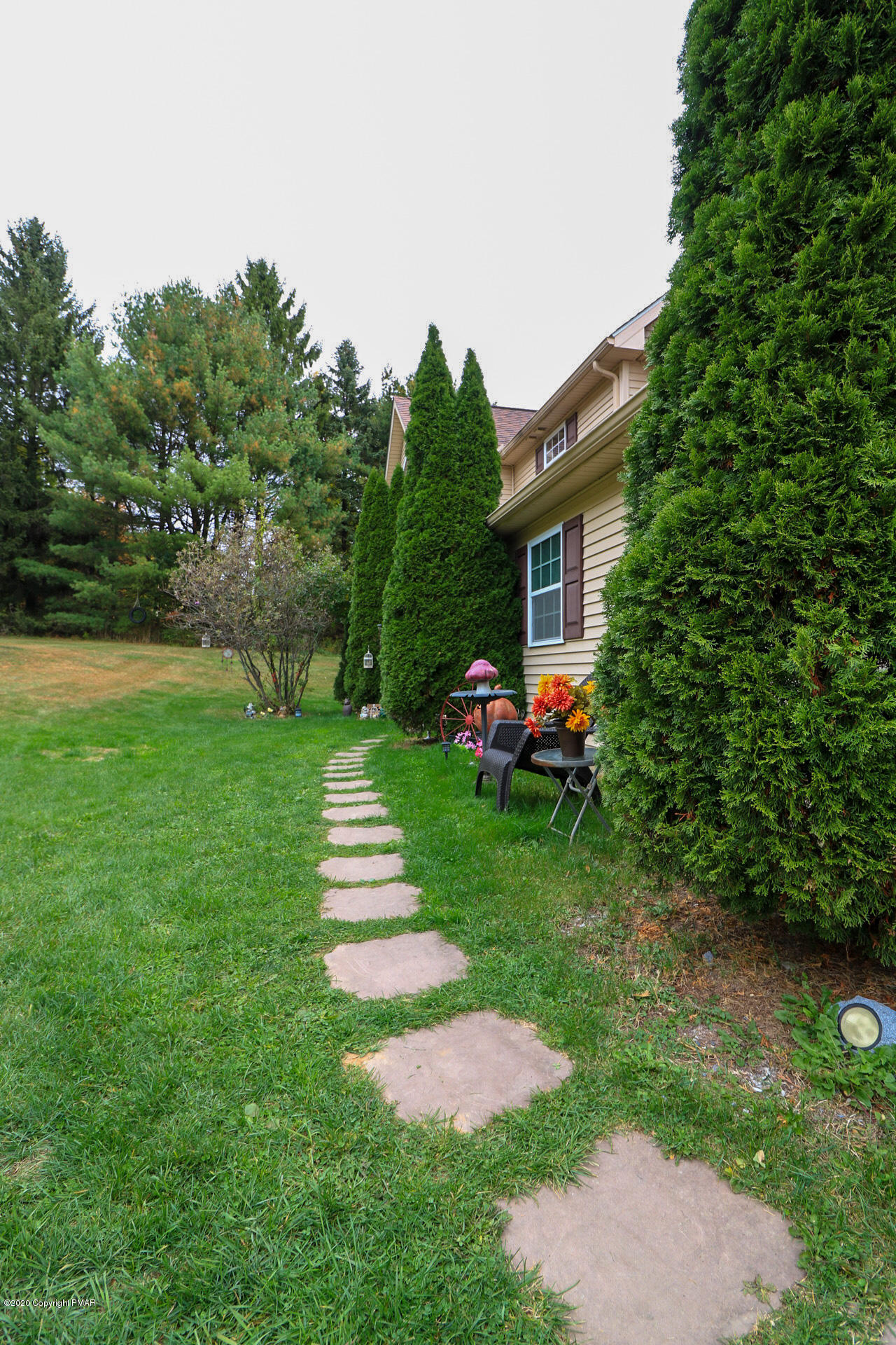 1024 State Road Effort, PA 18330 - Photo 4 of 46 a front view of a house with garden