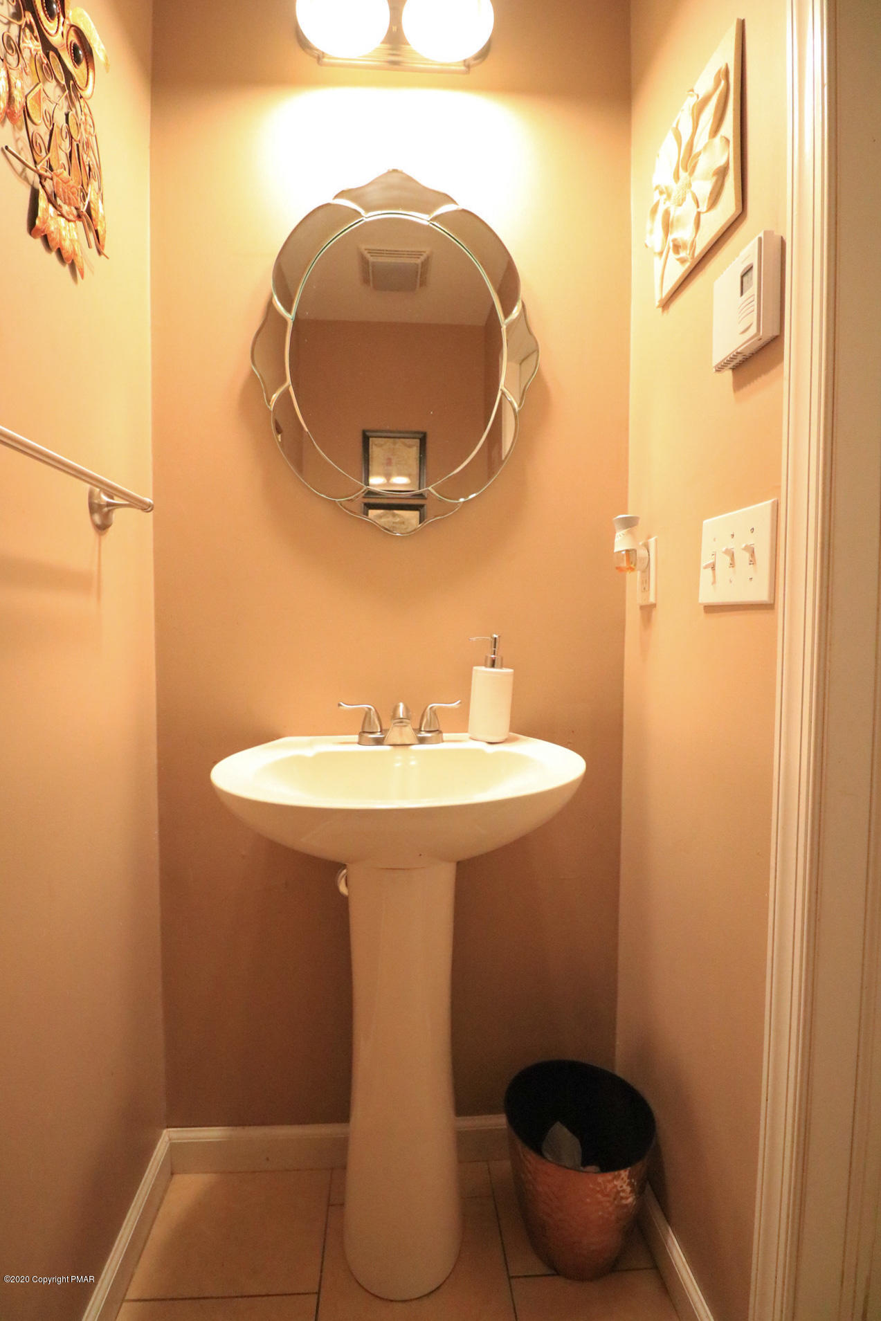 1024 State Road Effort, PA 18330 - Photo 9 of 46 a bathroom with a sink and mirror