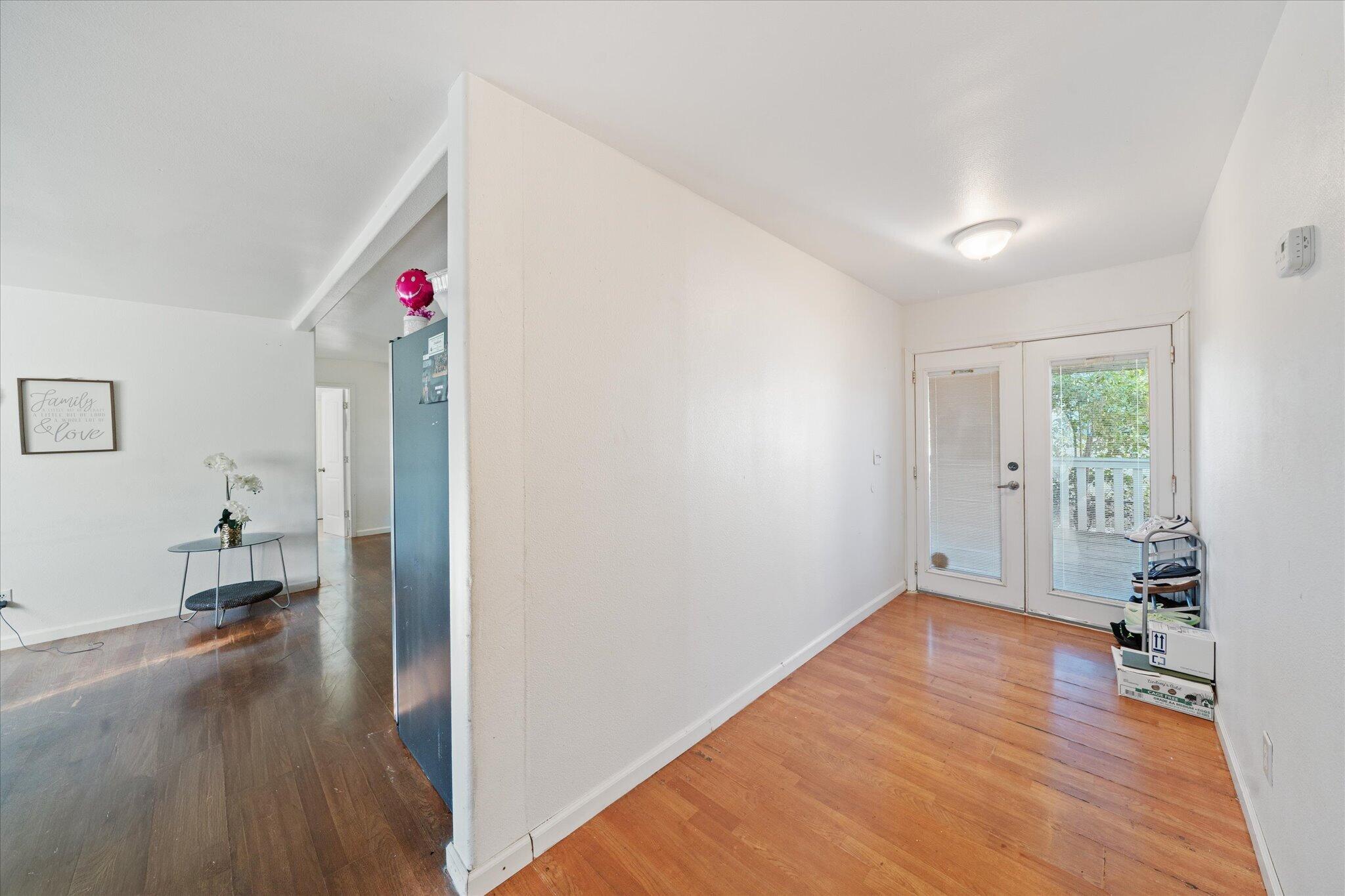 2494 Delta Place, Unit 71 Redding, CA 96002 - Photo 6 of 24 a view of hallway with wooden floor and cabinet