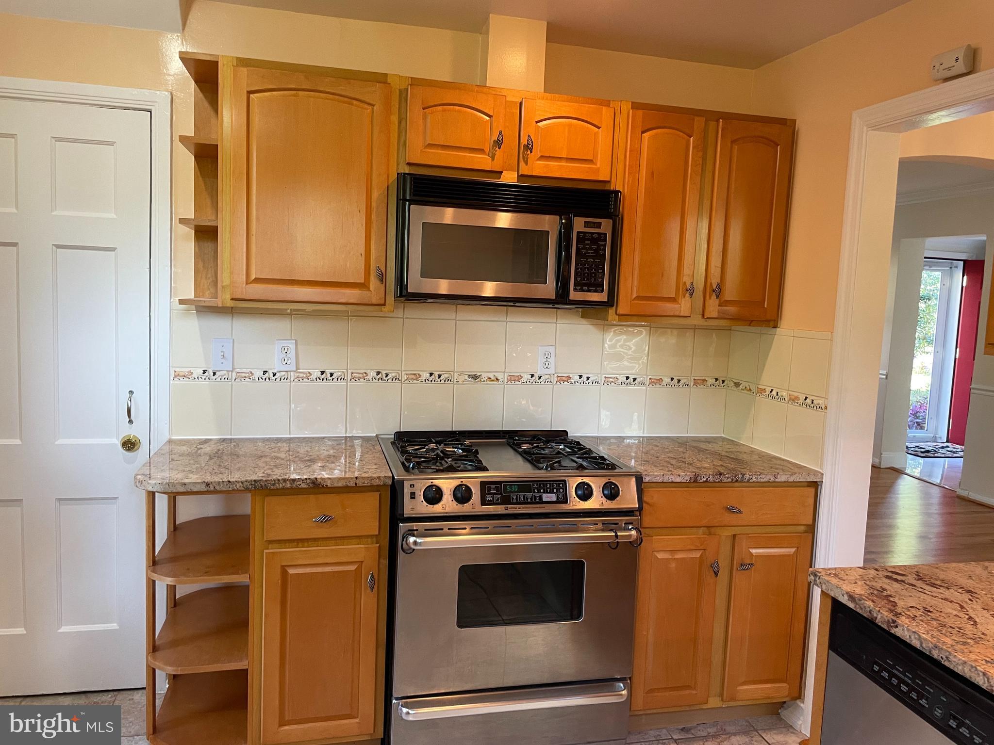 610 Ritchie Avenue Silver Spring, MD 20910 - Photo 12 of 30 kitchen with stainless appliances