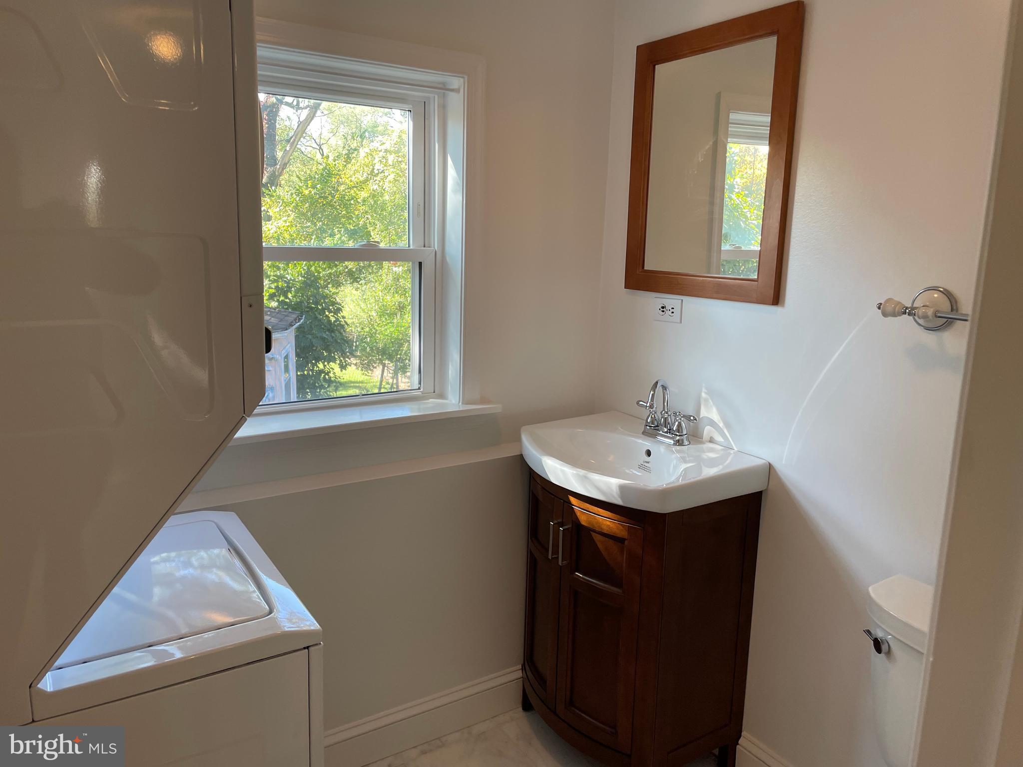 610 Ritchie Avenue Silver Spring, MD 20910 - Photo 5 of 30 half bath and laundry