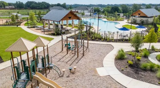 a view of a park with swings