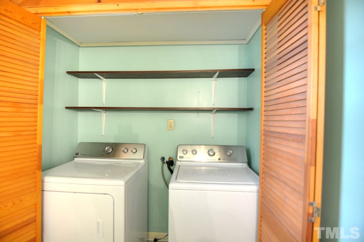 4016 Willow Oak Road Raleigh, NC 27604 - Photo 18 of 21 a utility room with dryer and washer