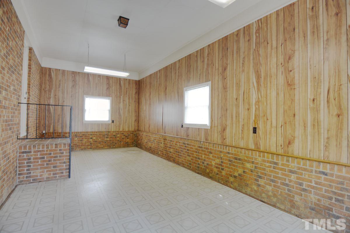 4016 Willow Oak Road Raleigh, NC 27604 - Photo 20 of 21 a view of an empty room and window