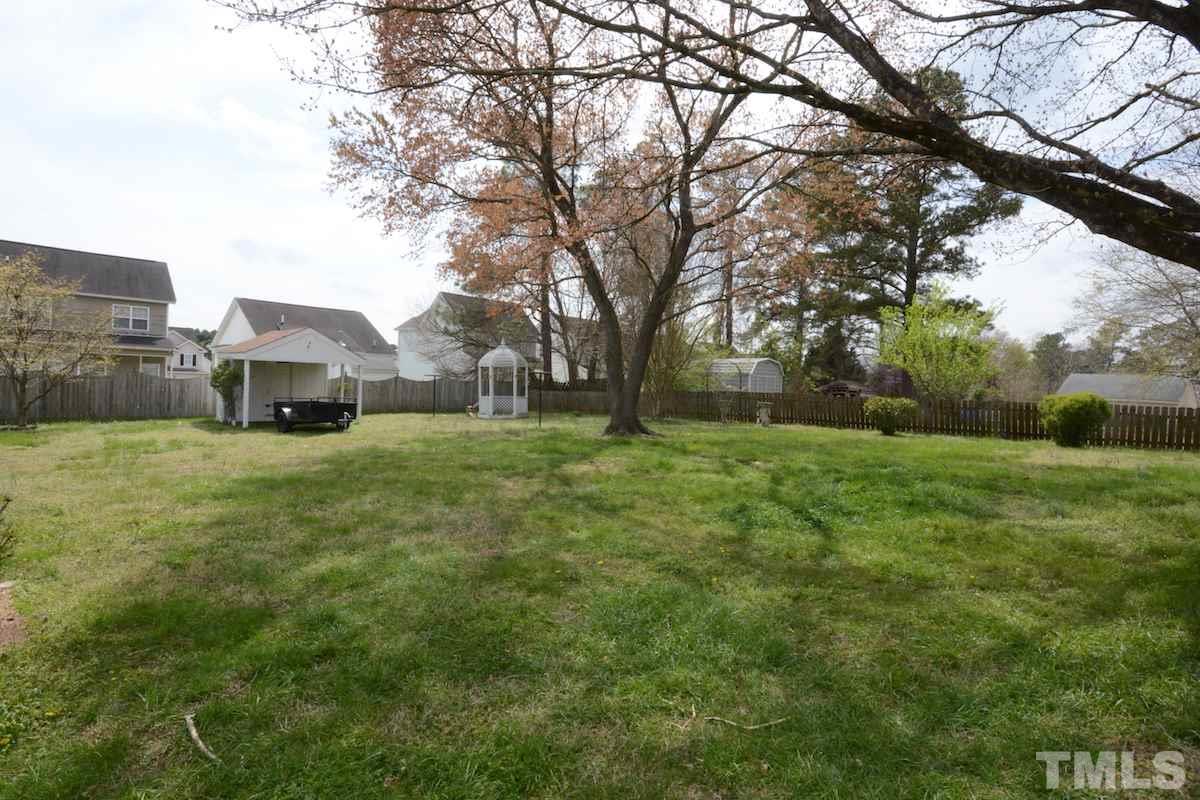 4016 Willow Oak Road Raleigh, NC 27604 - Photo 4 of 21 a front view of a house with a yard