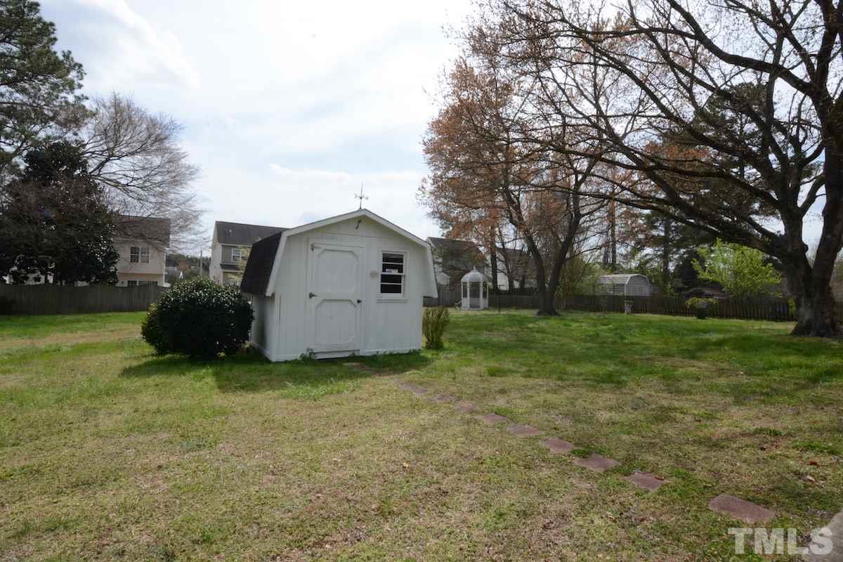 4016 Willow Oak Road Raleigh, NC 27604 - Photo 5 of 21 a view of a house with backyard