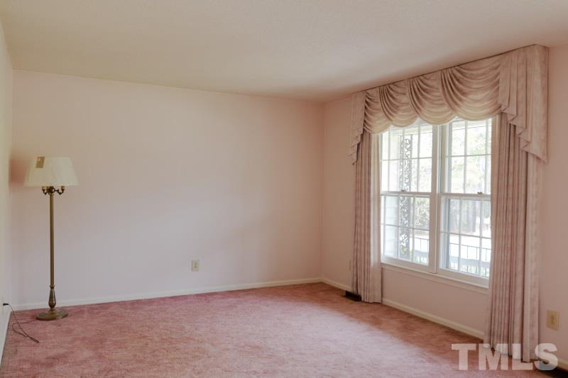 4016 Willow Oak Road Raleigh, NC 27604 - Photo 10 of 21 a view of an empty room with a window