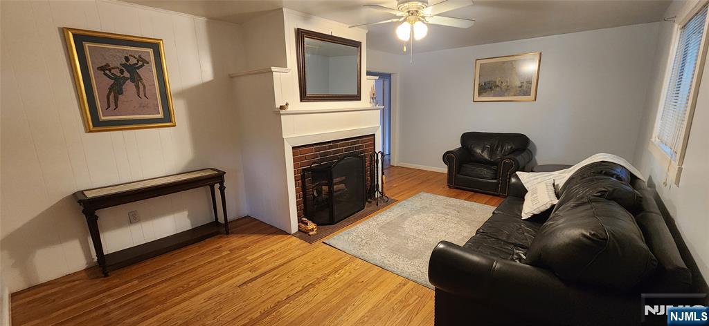 a bedroom with a bed and a fireplace