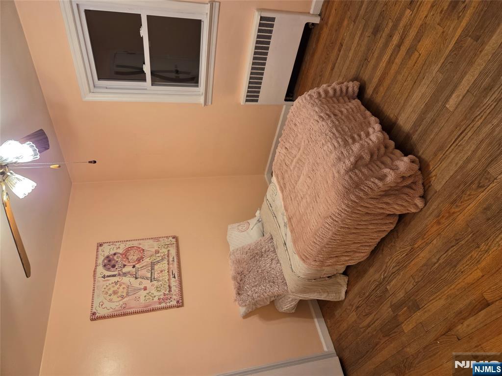 276 Franklin Turnpike Ridgewood, NJ 07450 - Photo 11 of 23 a bedroom with a bed and a window
