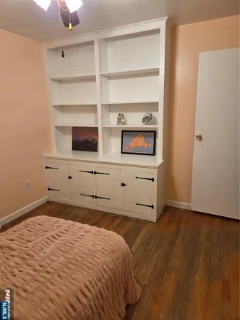 a room with a sink and a mirror