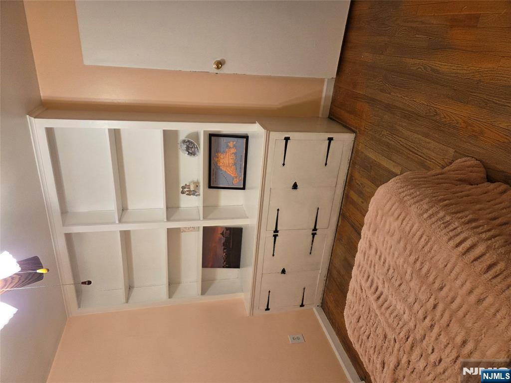 276 Franklin Turnpike Ridgewood, NJ 07450 - Photo 12 of 23 a bedroom with a bed and a window