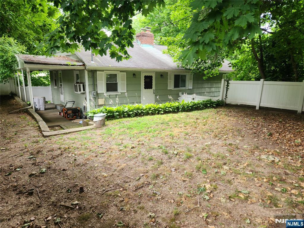 276 Franklin Turnpike Ridgewood, NJ 07450 - Photo 22 of 23 a front view of a house with a yard