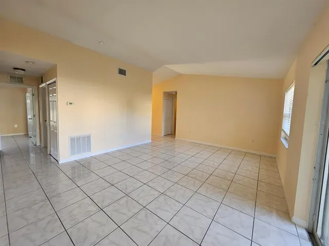 a view of a room with a hallway