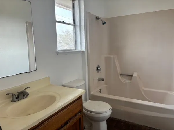 a bathroom with a sink and a toilet