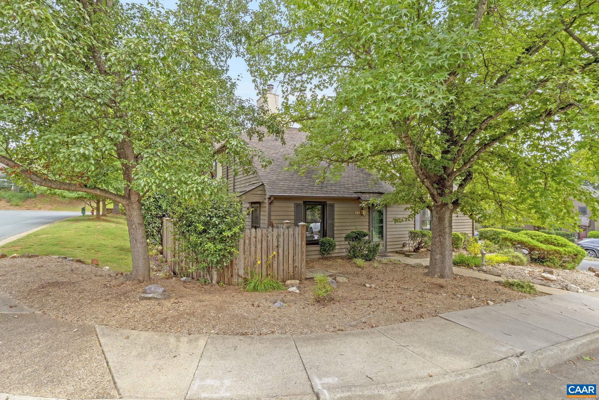 767 Exton Court Charlottesville, VA 22901 - Photo 11 of 34 a front view of a house with a yard