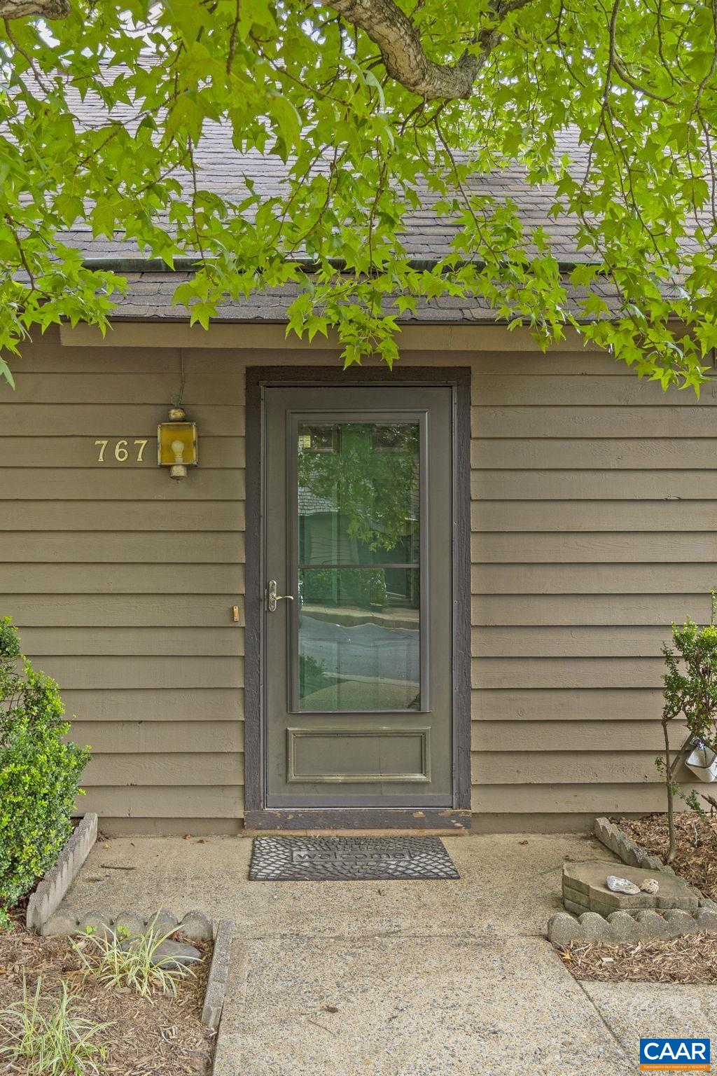 767 Exton Court Charlottesville, VA 22901 - Photo 12 of 34 a front view of a house with garden