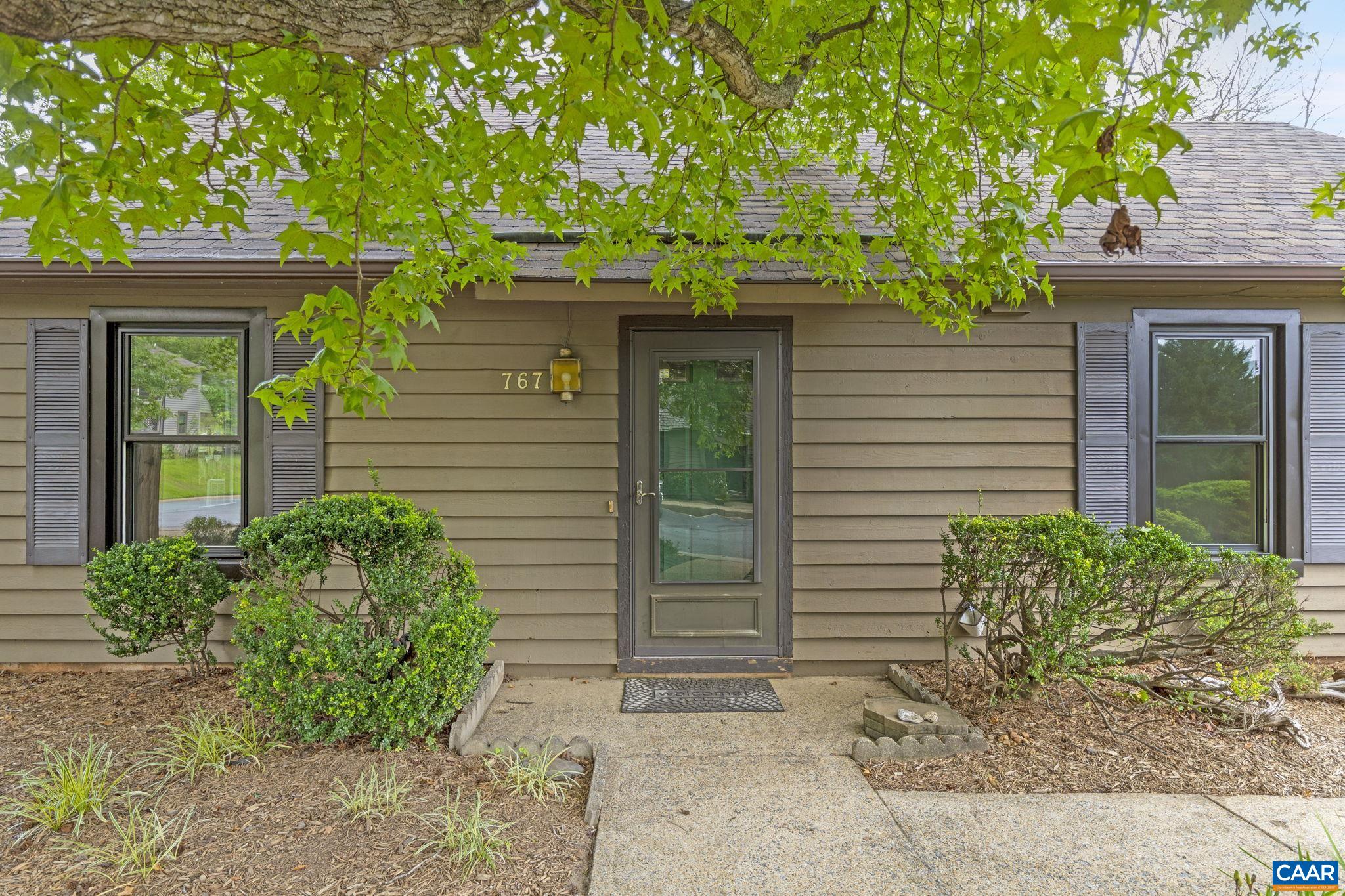 767 Exton Court Charlottesville, VA 22901 - Photo 14 of 34 a front view of a house with garden