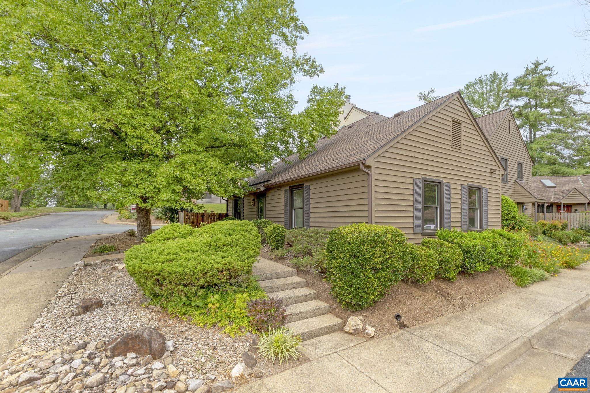 767 Exton Court Charlottesville, VA 22901 - Photo 7 of 34 a front view of a house with garden