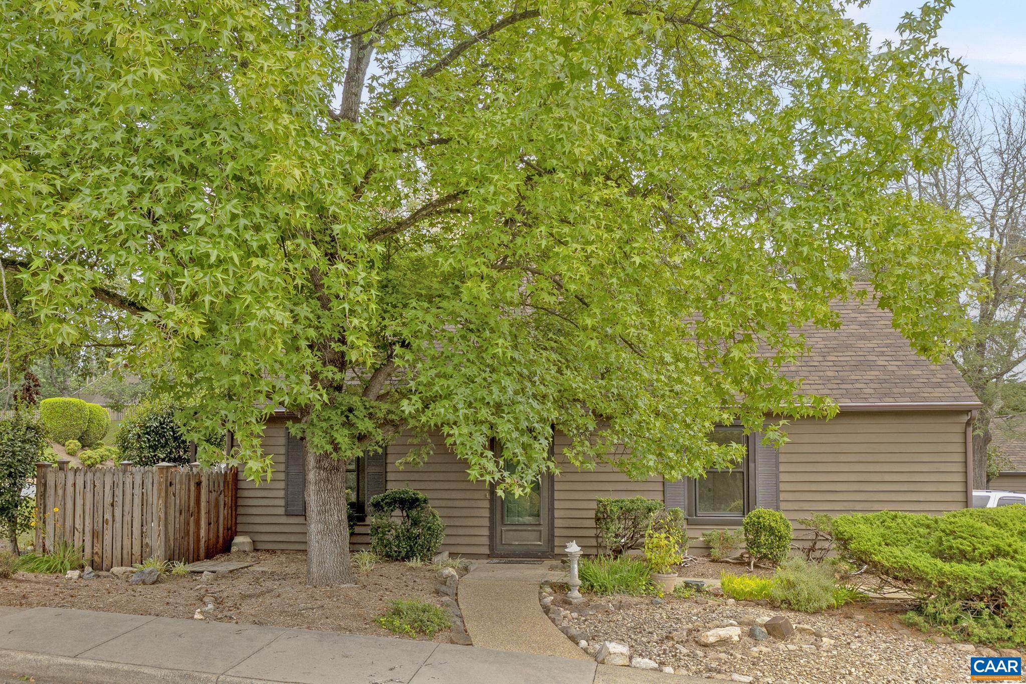 767 Exton Court Charlottesville, VA 22901 - Photo 9 of 34 a front view of a house with a tree