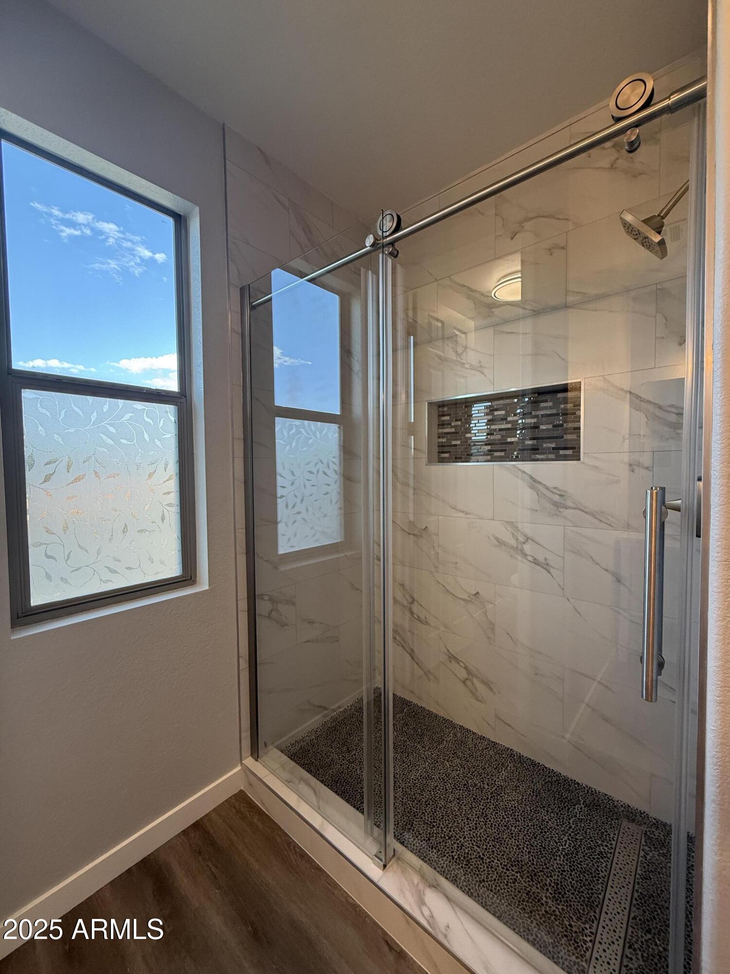 2972 West South Butte Road Queen Creek, AZ 85144 - Photo 13 of 17 a bathroom with a shower and a sink