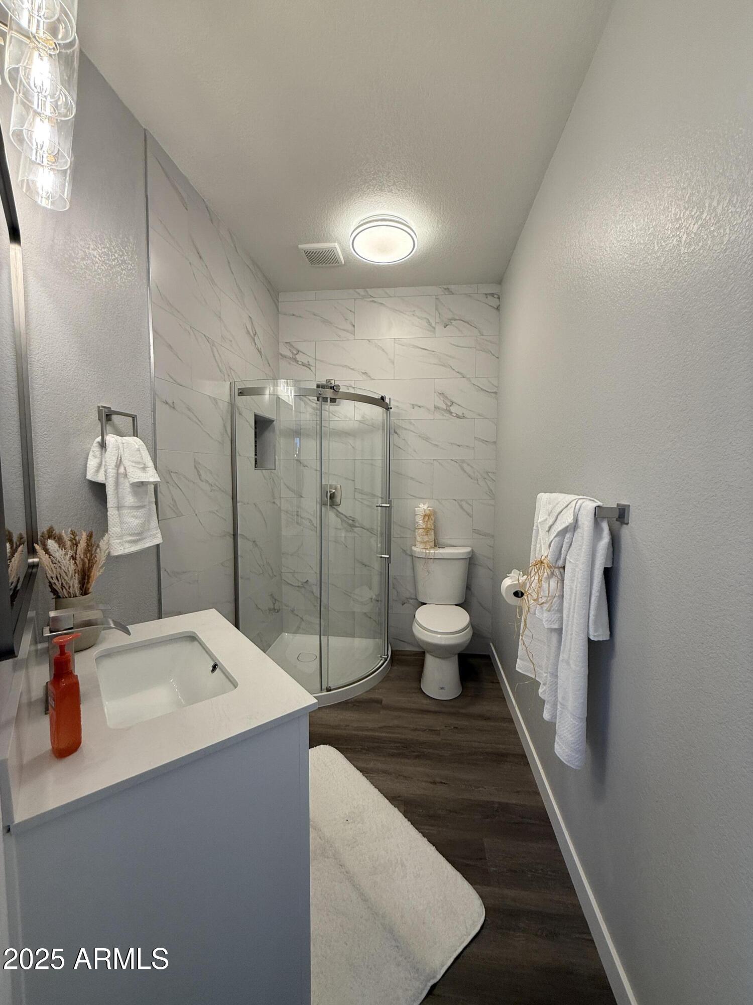 2972 West South Butte Road Queen Creek, AZ 85144 - Photo 8 of 17 a bathroom with a sink and mirror