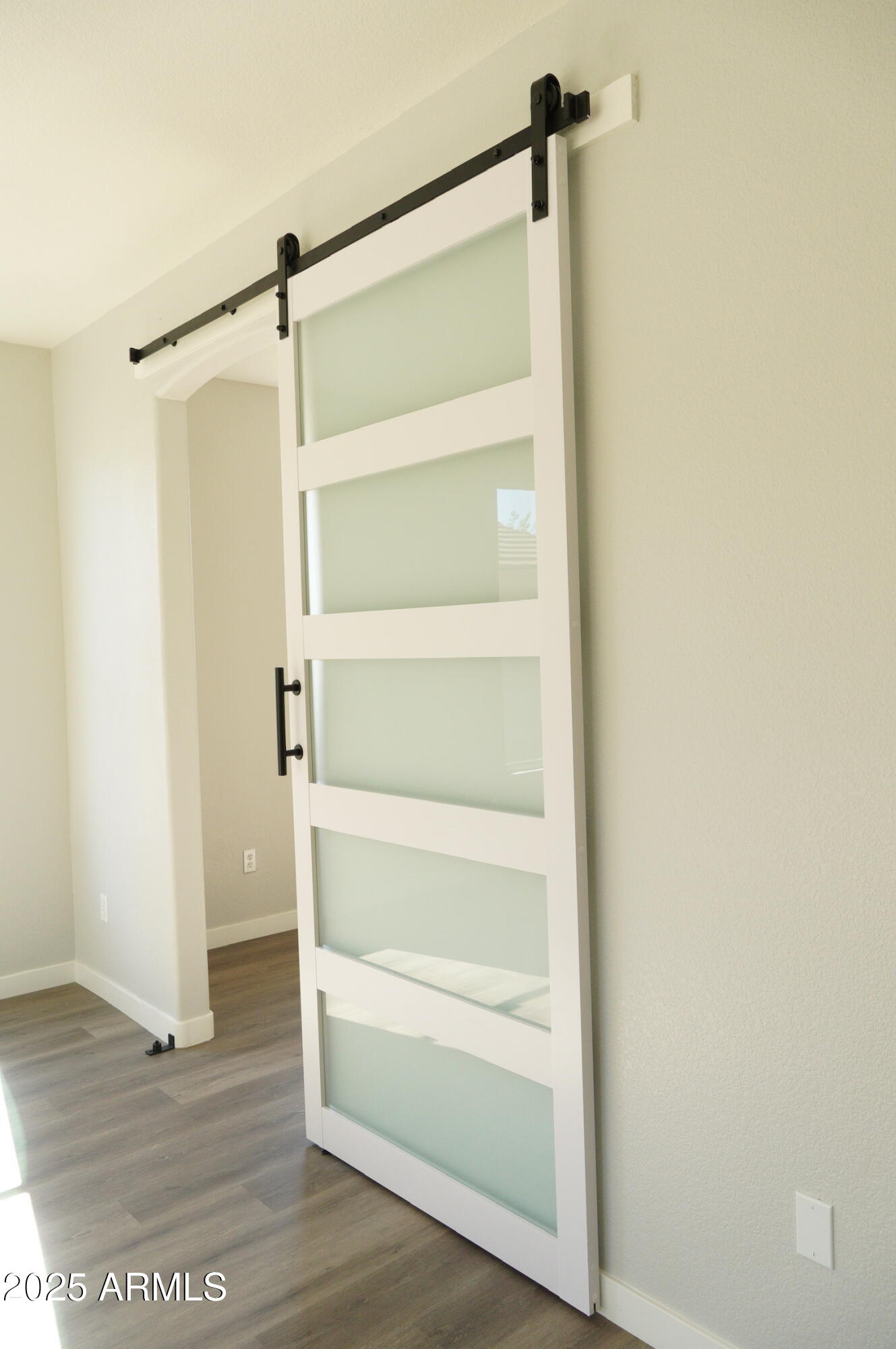 2972 West South Butte Road Queen Creek, AZ 85144 - Photo 9 of 17 a view of walk in closet with empty racks