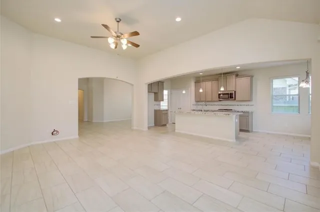 a view of a kitchen with a sink cabinets and window