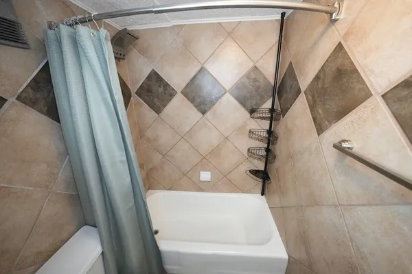 a bathroom with a sink and toilet