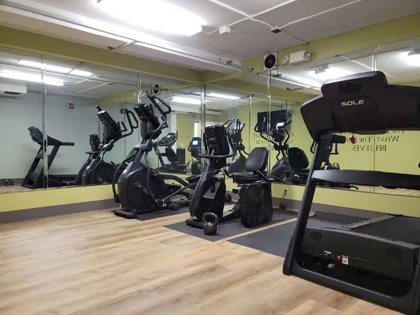 a view of a room with gym equipment