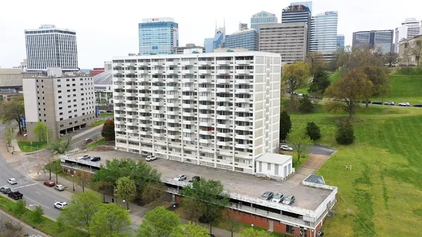 a view of a city with tall buildings