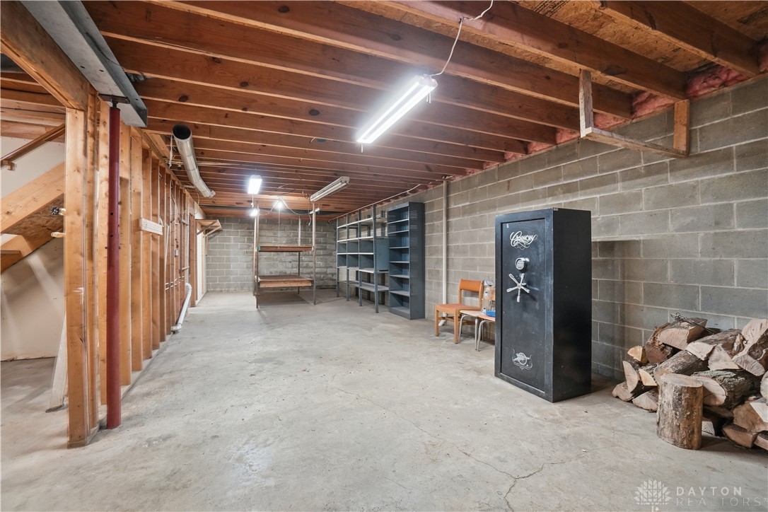7553 Coffin Station Road Springfield, OH 45502 - Photo 79 of 95 This spacious basement offers versatile storage solutions and potential for customization.