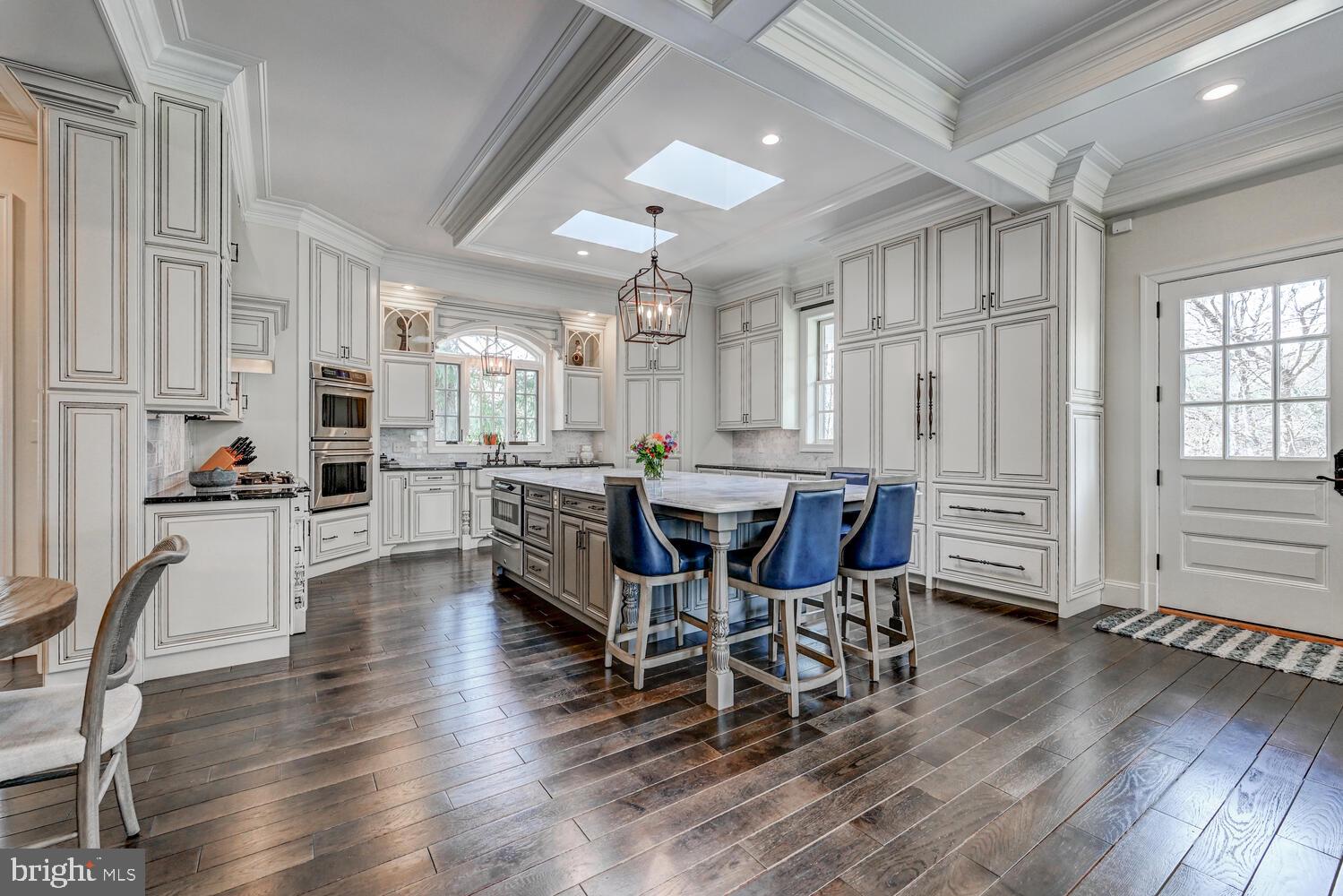 1848 Circle Road Towson, MD 21204 - Photo 15 of 69 a view of a dining room with furniture and wooden floor