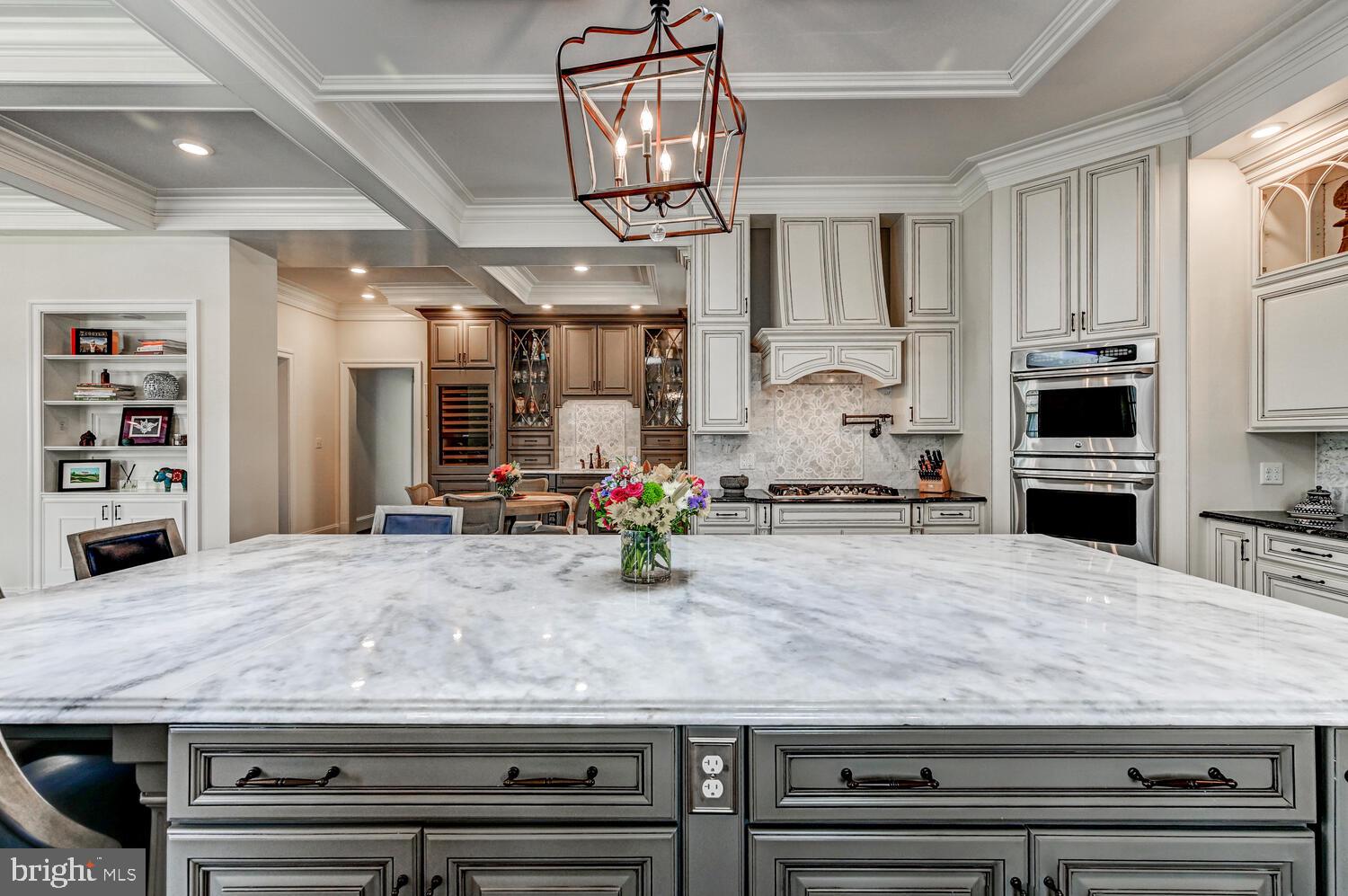 1848 Circle Road Towson, MD 21204 - Photo 25 of 69 a kitchen with stainless steel appliances kitchen island granite countertop a stove and cabinets