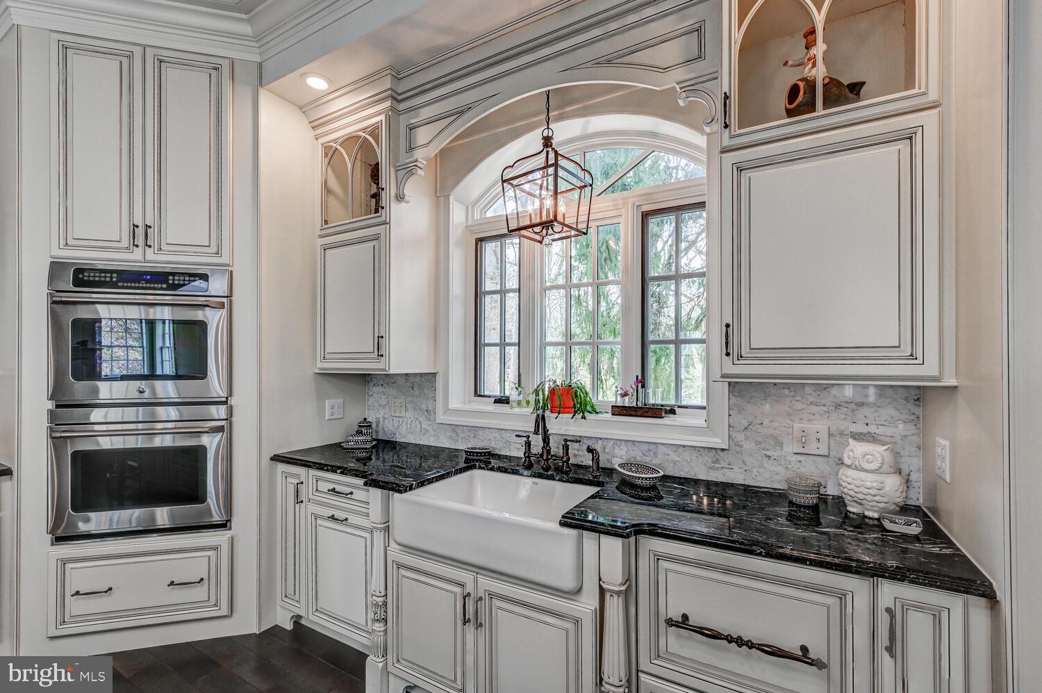 1848 Circle Road Towson, MD 21204 - Photo 26 of 69 a kitchen with stainless steel appliances granite countertop a stove and a microwave