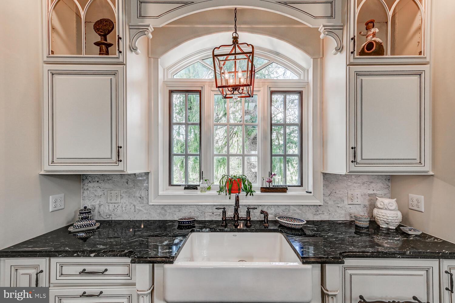1848 Circle Road Towson, MD 21204 - Photo 27 of 69 a kitchen with stainless steel appliances granite countertop a stove a sink and a microwave