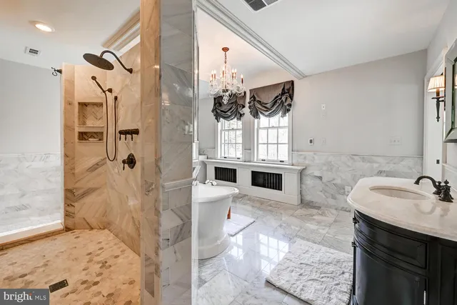 a view of a patio with a table and chairs