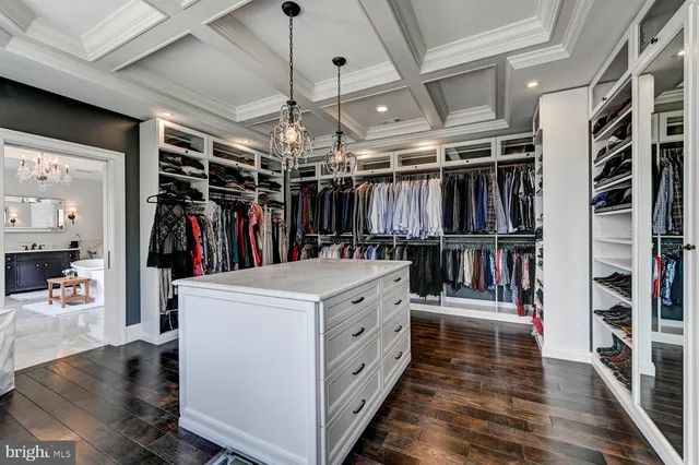 a view of a patio with furniture and table and chairs