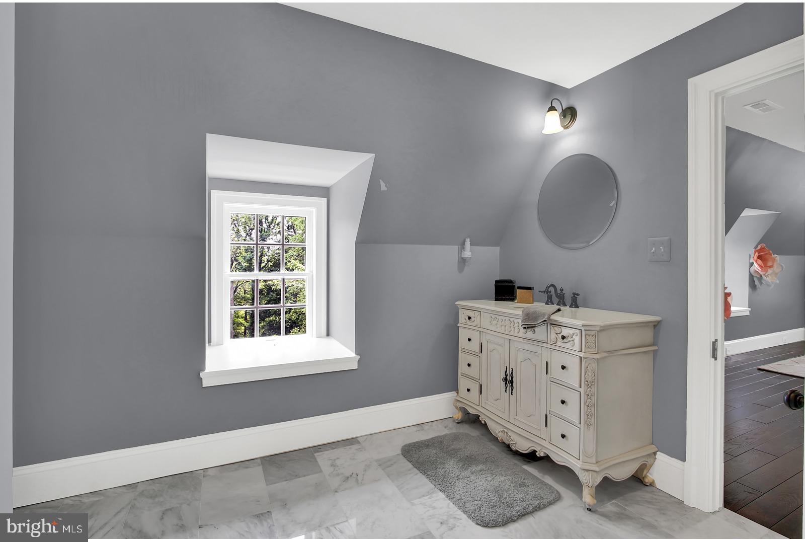 1848 Circle Road Towson, MD 21204 - Photo 47 of 69 a bathroom with a double vanity sink mirror and window