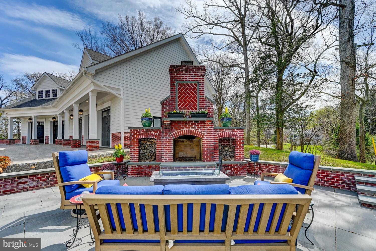 1848 Circle Road Towson, MD 21204 - Photo 59 of 69 a view of a patio with a table chairs and a fire pit
